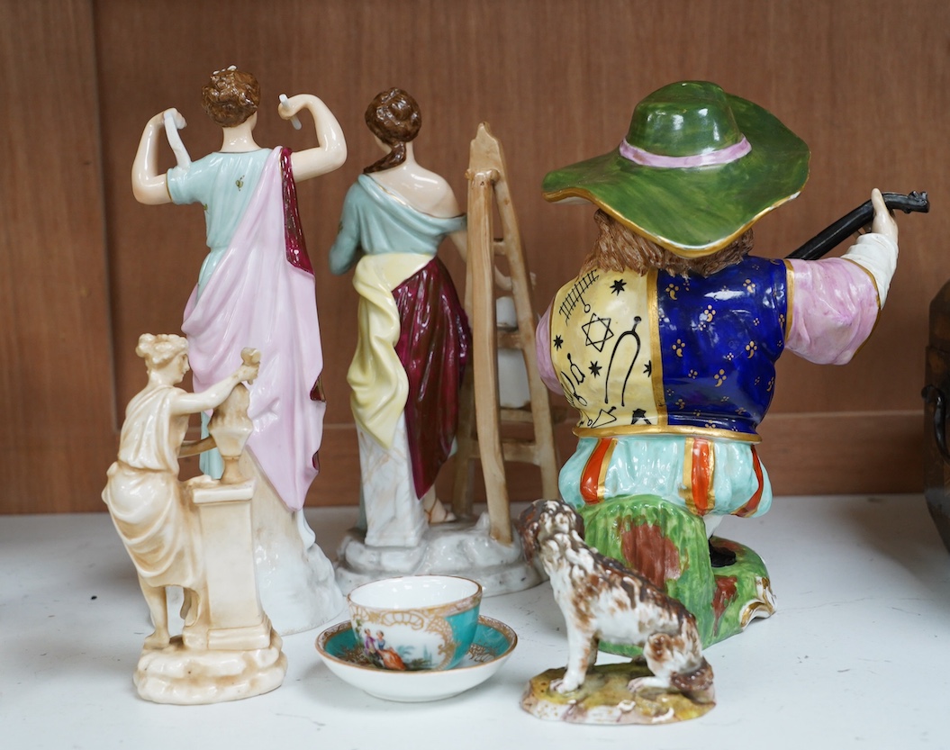 A 19th century French Mansion House Dwarf, a pair of Volkstedt figures, a Meissen dog, cup and saucer and a German porcelain female sculpture, tallest 21cm. Condition - fair to good, a few minor chips